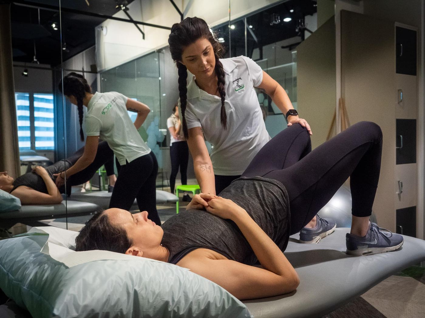 A physiotherapist treating a patient